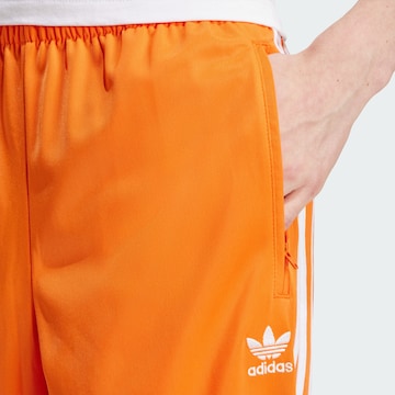 ADIDAS ORIGINALS Regular Pants 'Adicolor Classics Firebird' in Orange