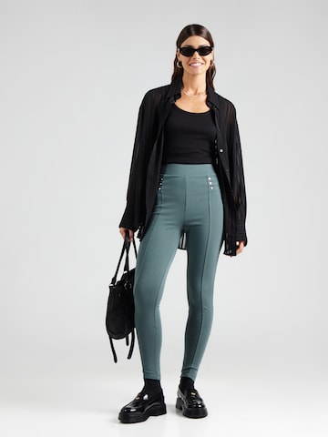 Regular Leggings 'Rita' ABOUT YOU en vert