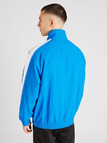 PUMA Демисезонная куртка в Синий