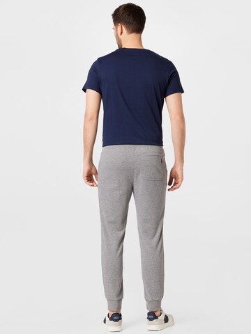 SKECHERS Tapered Sports trousers in Grey