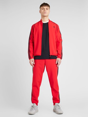 Veste de survêtement ADIDAS ORIGINALS en rouge