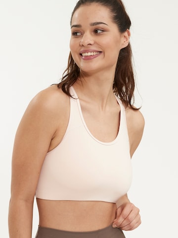 Athlecia Bustier Biustonosz sportowy 'Inere' w kolorze różowy: przód