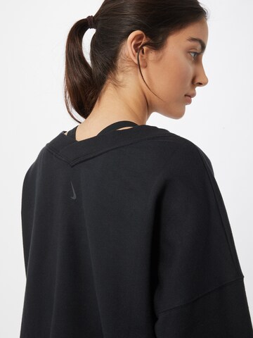 NIKE Sports sweatshirt 'Luxe' in Black