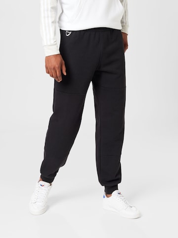 ADIDAS ORIGINALS Tapered Trousers 'Adventure' in Black: front