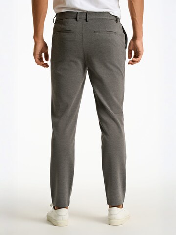 Junk de Luxe Slim fit Trousers in Black