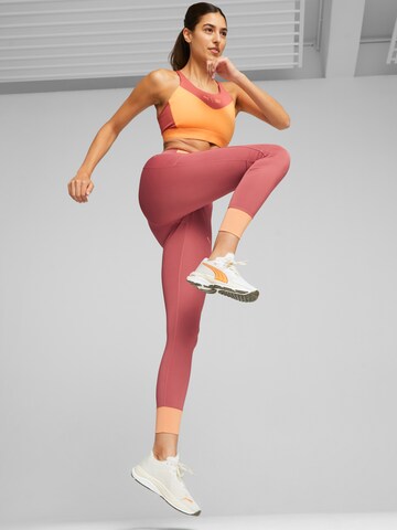 Skinny Pantalon de sport PUMA en rouge : devant