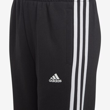 ADIDAS SPORTSWEAR Конический (Tapered) Спортивные штаны 'Essentials' в Черный