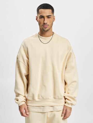 Felpa di DEF in beige: frontale