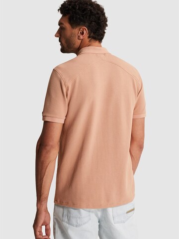 CAST IRON Paita 'Polo shirt with two-tone waffle texture' värissä oranssi