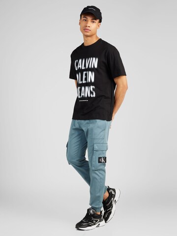 Calvin Klein Jeans Ozke Kargo hlače | modra barva