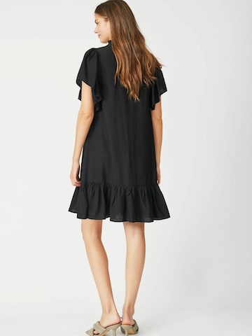 Robe 'Hera' co'couture en noir