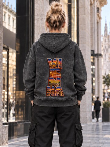 LUNØIR StudioSweater majica 'Vienna City Lights – Vermilion' - crna boja