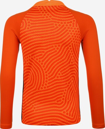 T-Shirt fonctionnel NIKE en orange