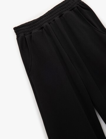 Koton Wide Leg Hose in Schwarz