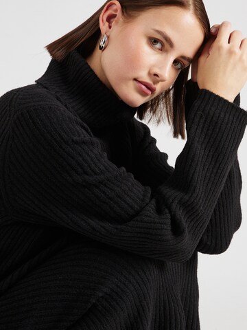 Robes en maille 'JDYANNIE' JDY en noir