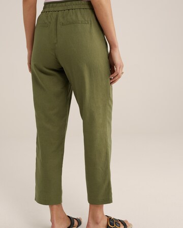 WE Fashion Loose fit Trousers in Green