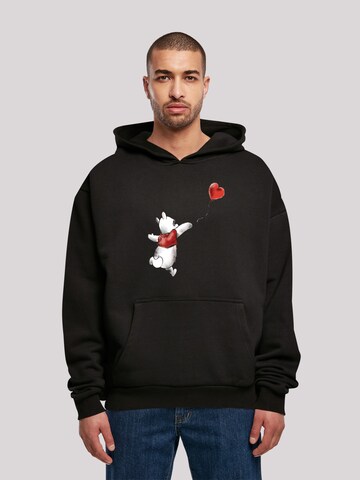 F4NT4STIC Sweatshirt 'Disney Winnie The Pooh Winnie & Balloon' in Zwart: voorkant