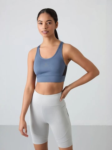 Haut de sport Tommy Life en bleu