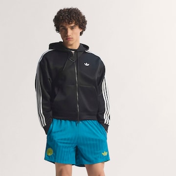 ADIDAS PERFORMANCE - Loosefit Pantalón deportivo 'Kolumbien' en azul