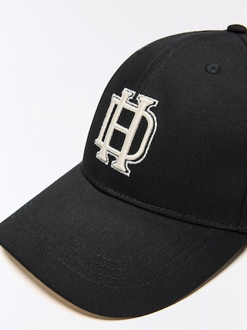 Casquette 'NEW VARSITY' Bershka en noir