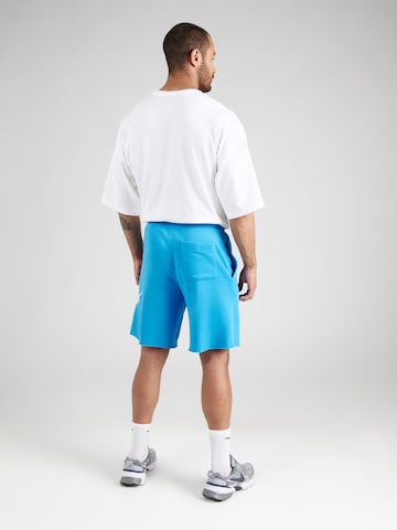 Loosefit Pantaloni 'CLUB ALUMNI' di Nike Sportswear in blu
