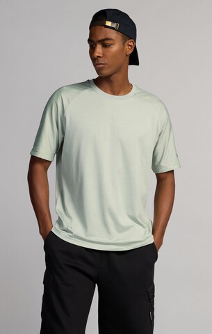 Champion T-Shirt in Grün: Vorderseite