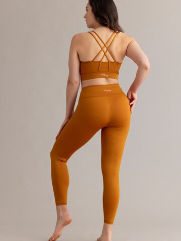 Hey Honey - Bustier Sujetador deportivo 'Criss Cross' en naranja
