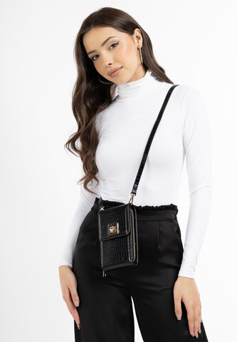 faina Crossbody bag in Black: front