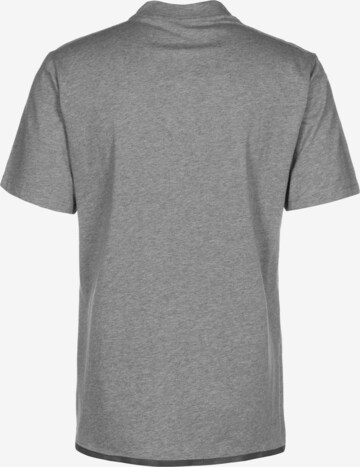 T-Shirt fonctionnel PUMA en gris