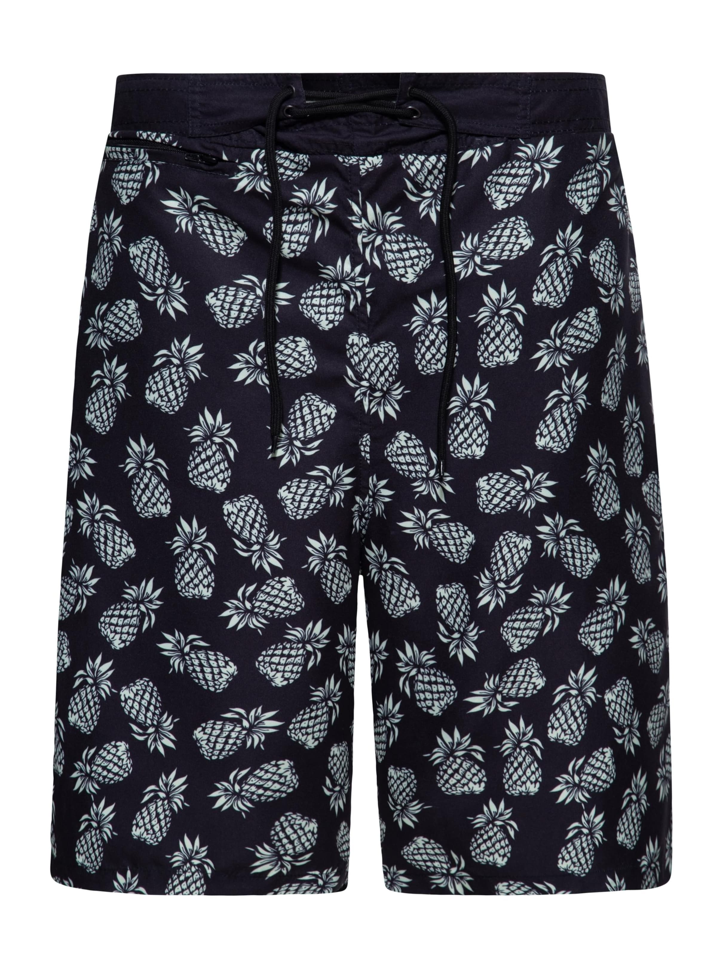King Kerosin Board Shorts 'Pineapple' in Black: front