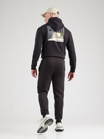 PUMA Конический (Tapered) Спортивные штаны 'Ess No. 1' в Черный