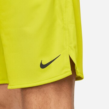NIKE Regular Workout Pants 'Totality Pro' in Yellow
