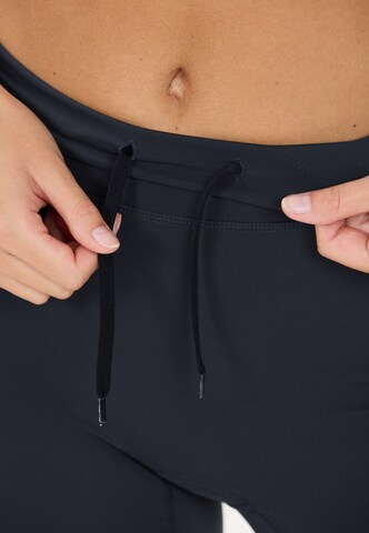 Athlecia Slimfit Sportbroek 'Aliya V2' in Blauw