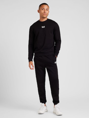 Survêtement EA7 Emporio Armani en noir : devant