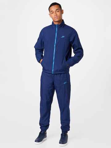 Nike SportswearJogging komplet - plava boja: prednji dio