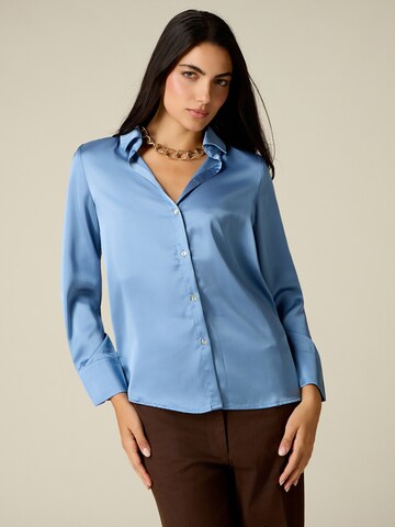 Camicia da donna di oltre in blu