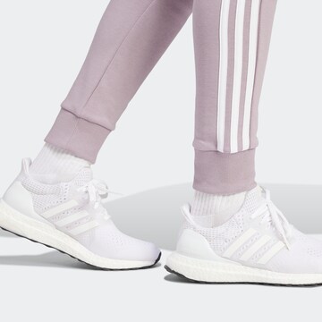 ADIDAS SPORTSWEAR Tapered Sporthose '3S FL' in Lila