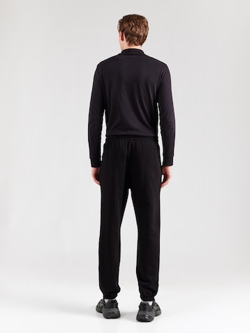 Tapered Pantaloni sport de la 4F pe negru
