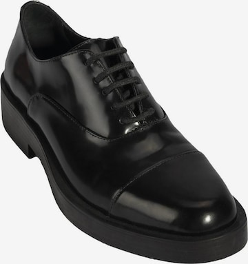 Desa Classic Flats in Black: front