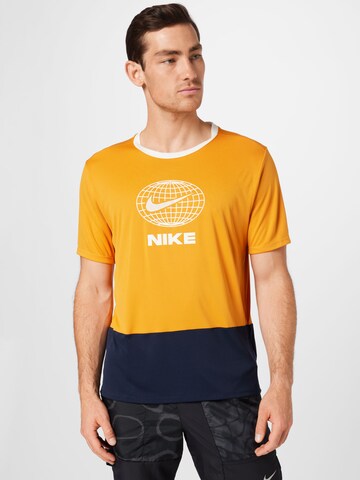 NIKE - Camiseta funcional en amarillo: frente