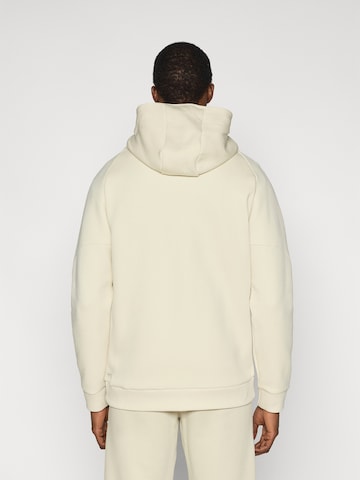 PUMA Sportovní mikina 'OM PUMATECH' – béžová