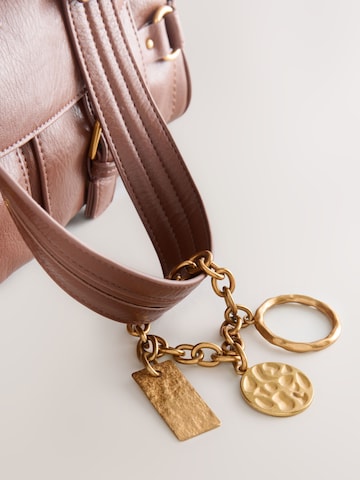 Next Shopper in Bruin