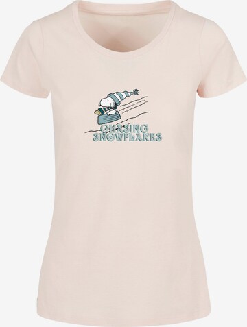 Merchcode T-Shirt 'Peanuts Chasing Snowflakes' in Pink: predná strana