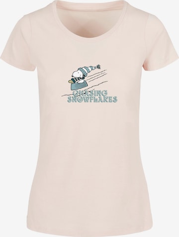 Merchcode Shirt 'Peanuts Chasing Snowflakes' in Roze: voorkant