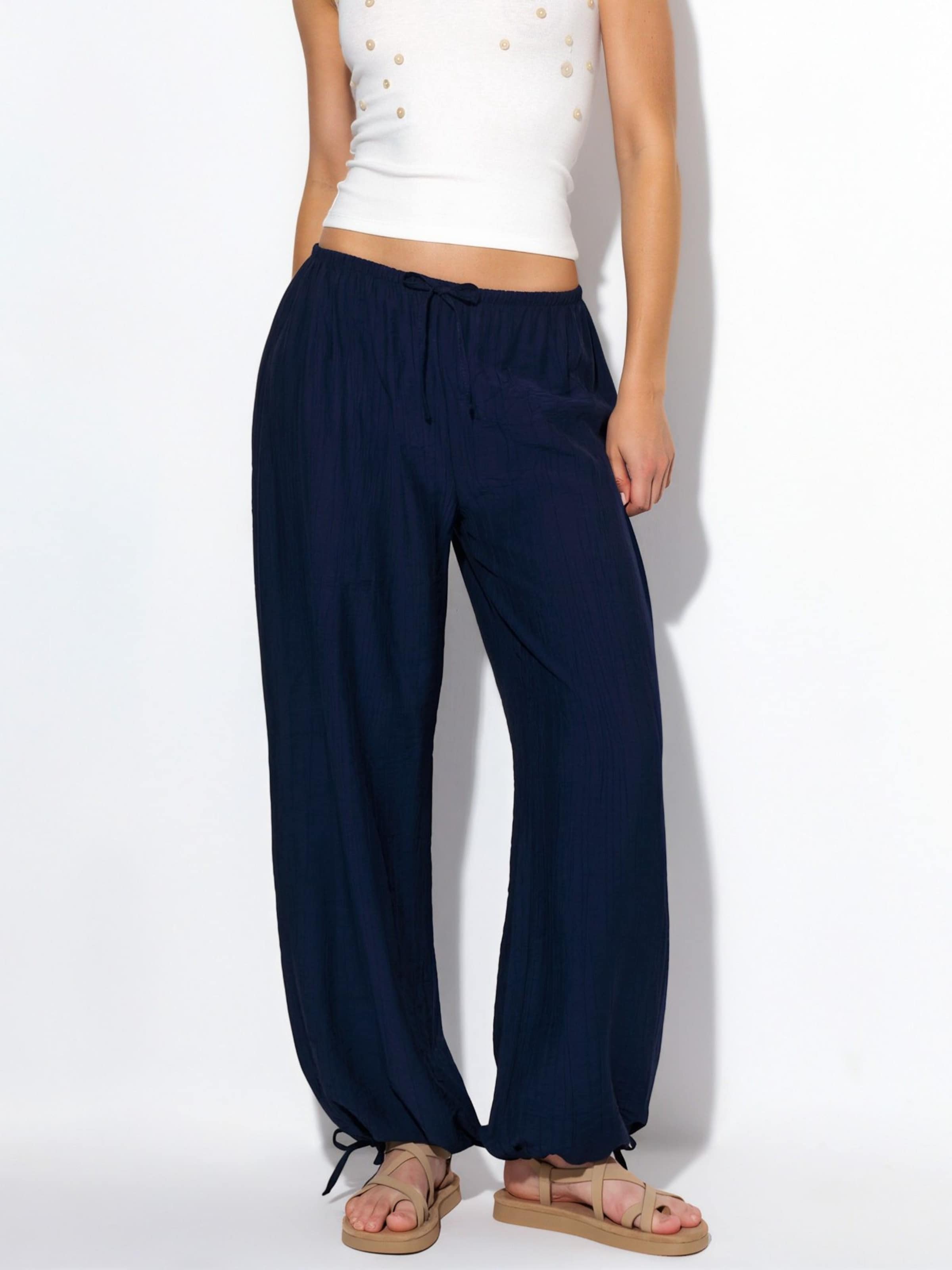 Busem Trousers in Blue: front