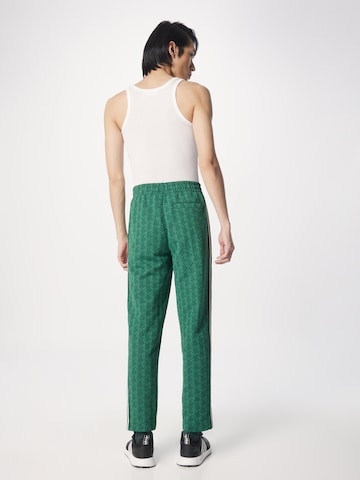 LACOSTE Normalny krój Spodnie w kolorze zielony