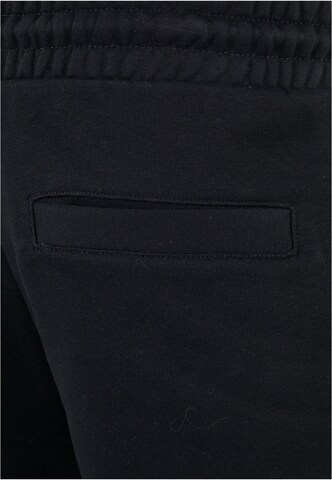 Regular Pantalon Karl Kani en noir