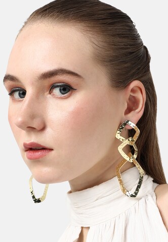 Boucles d'oreilles SOHI en or : devant