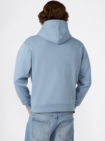 Champion Authentic Athletic Apparel Sweatshirt i blå