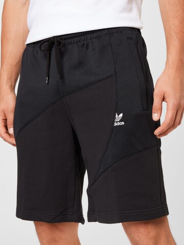 Regular Pantaloni sport 'Аdicolor Interlock' de la ADIDAS ORIGINALS pe negru